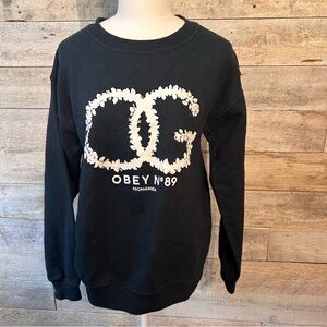Obey women's black crewneck‎ sweatshirt in size small